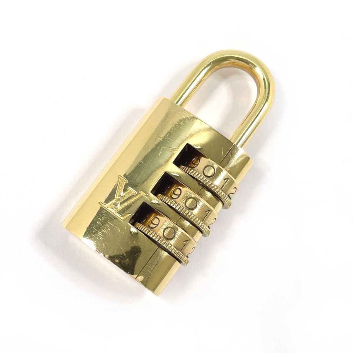 Louis Vuitton Cadena brass padlock Dial padlock Gold Handbag