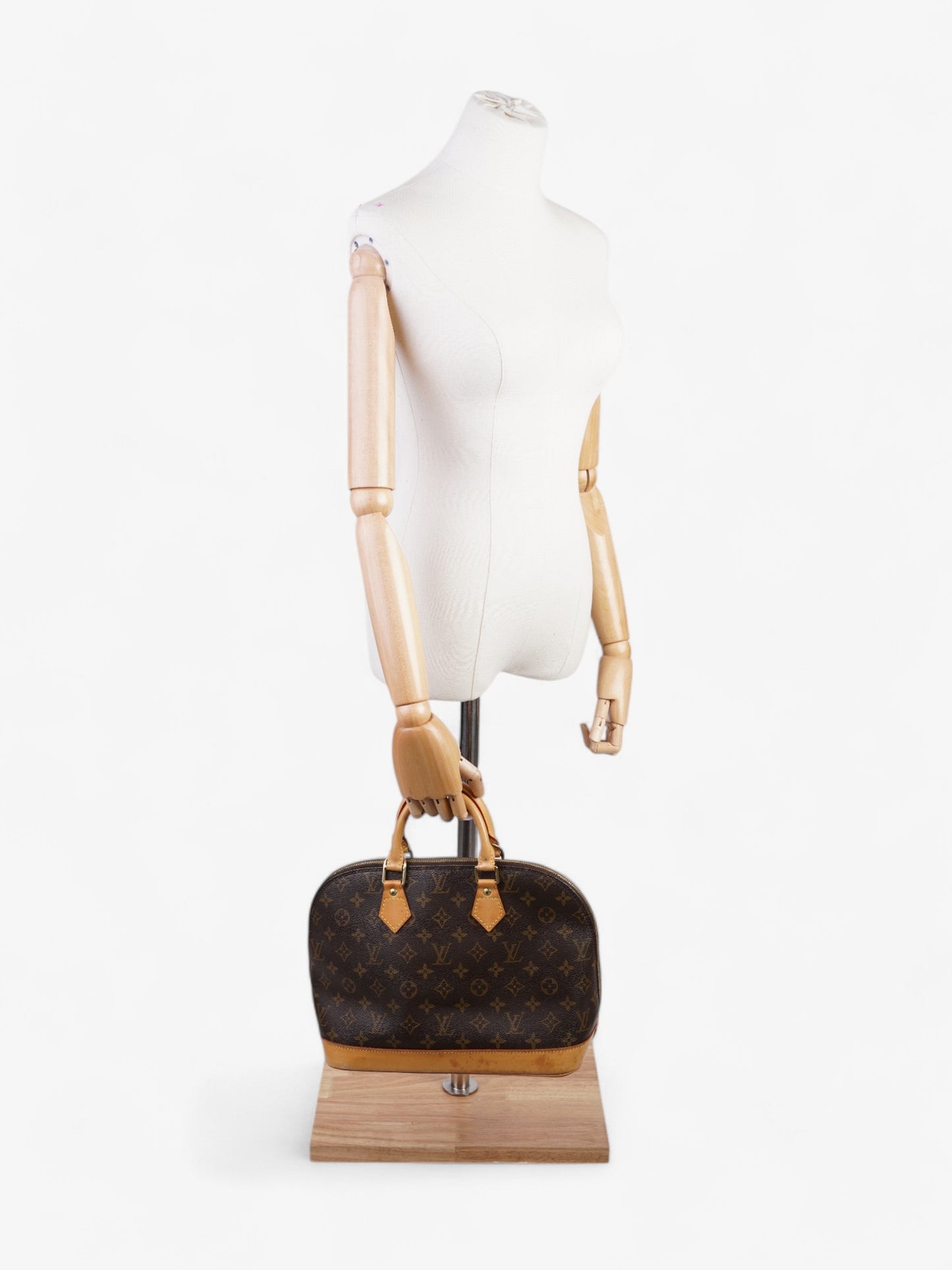 Louis Vuitton Alma Coated PM Monogram Canvas Coated Canvas Apparel