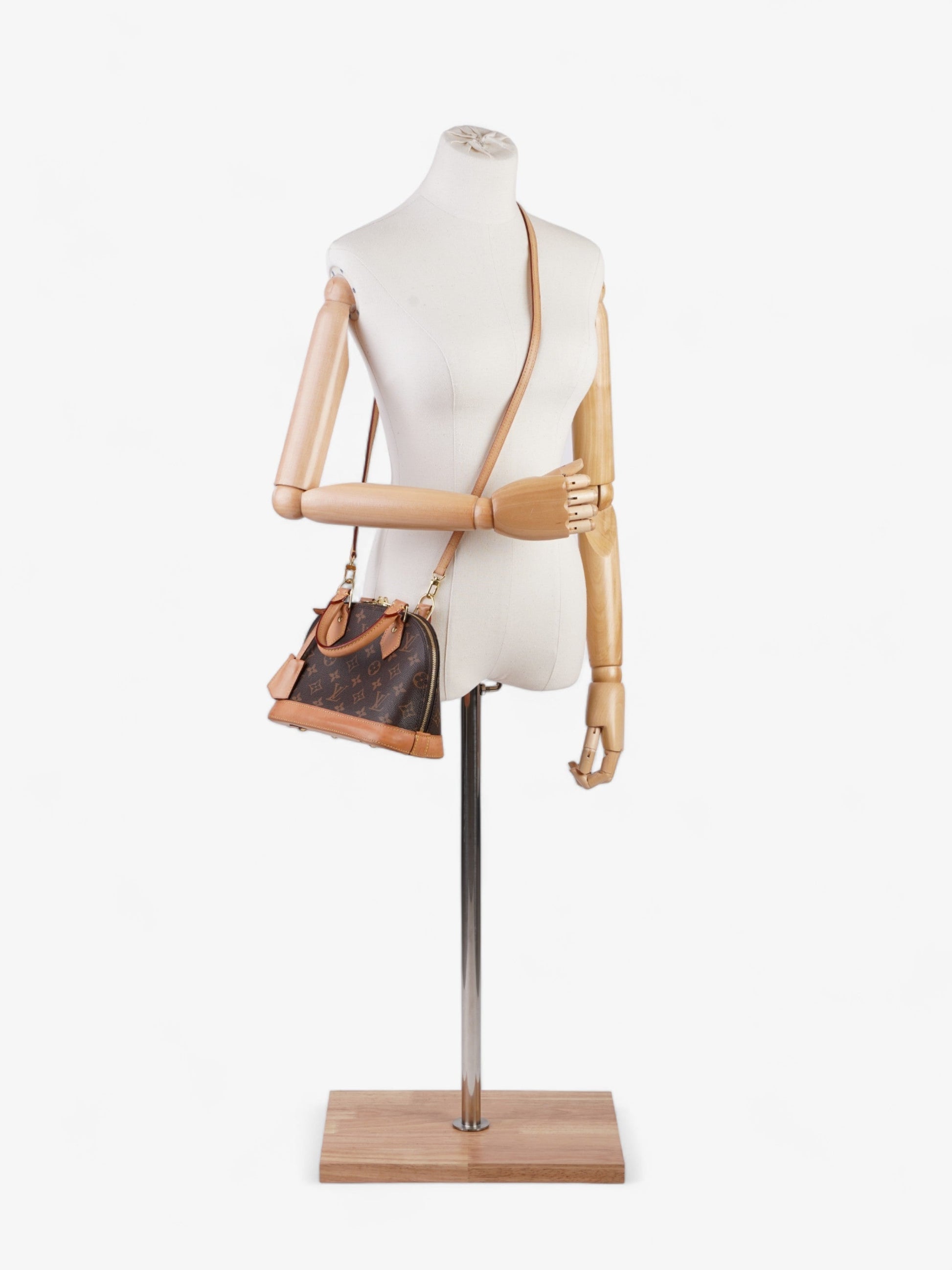 Louis Vuitton Alma BB Coated Monogram Canvas Coated Canvas Apparel
