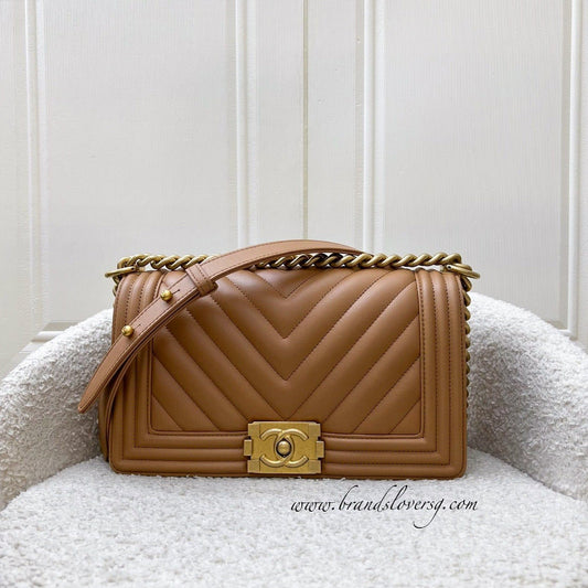 Chanel Medium Boy Flap in Chevron Quilted Caramel Lambskin and AGHW (Model: ) Accessory