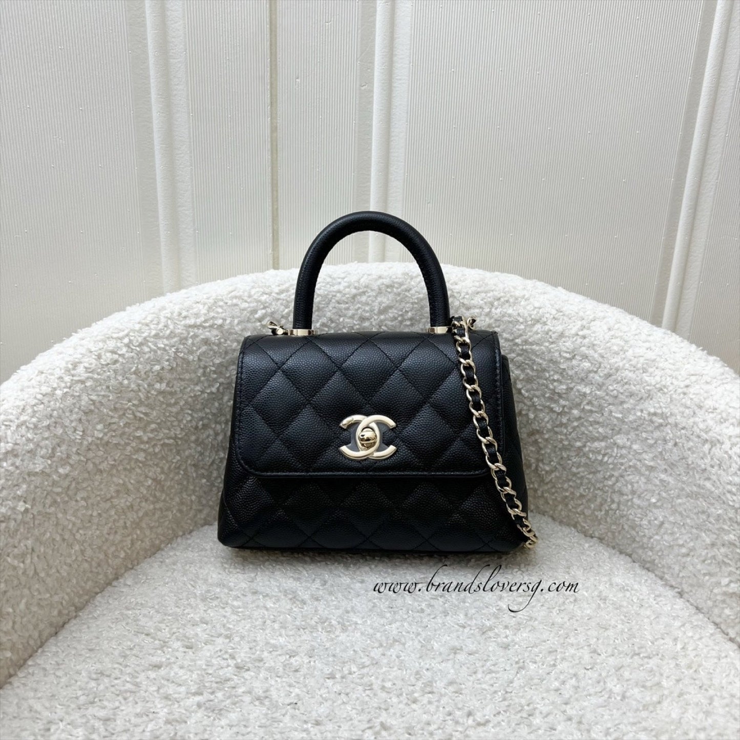 Chanel Micro Coco Handle Flap Bag in Black Caviar and LGHW ()