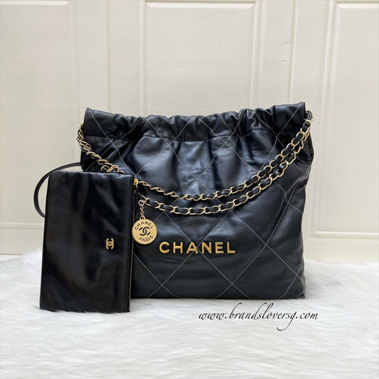 Chanel 22 Medium Hobo Handbag in Black Calfskin with White Stitch Quilting and AGHW (Model: )
