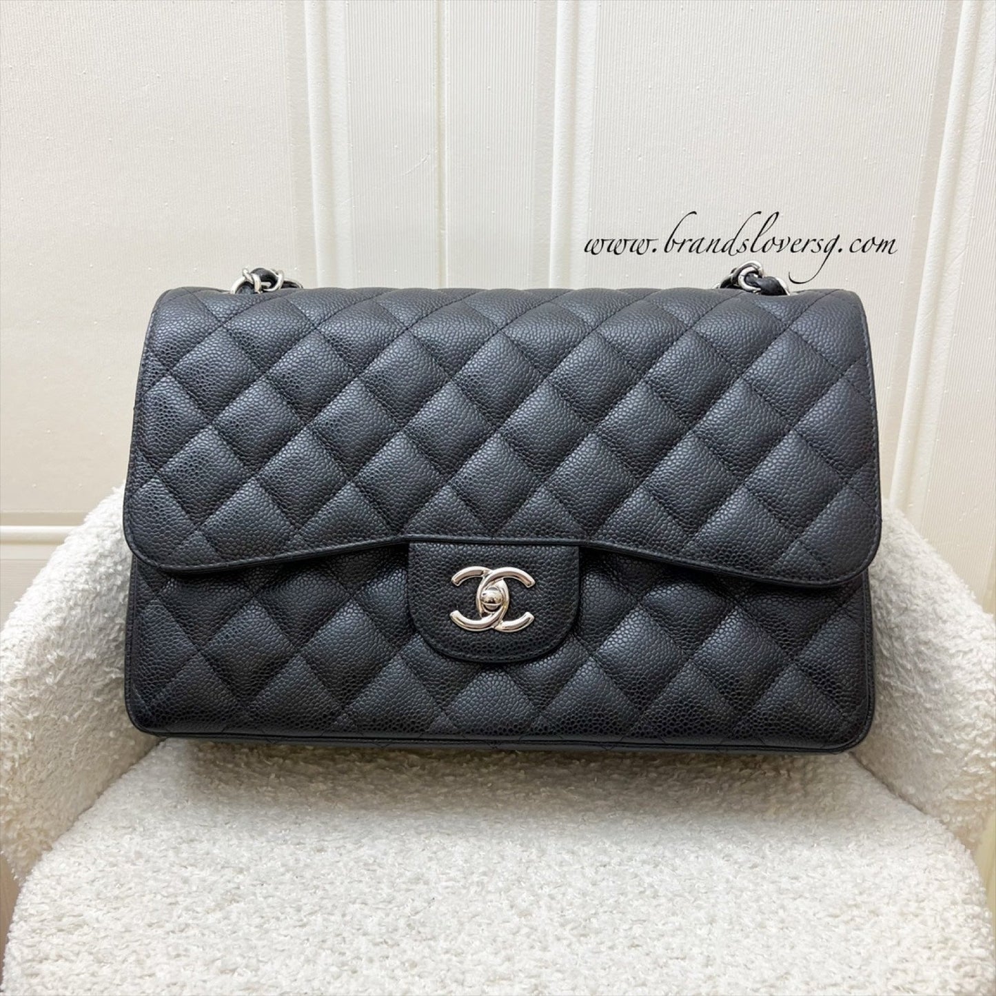 Chanel Jumbo Classic Flap CF in Black Caviar and SHW Accessory
