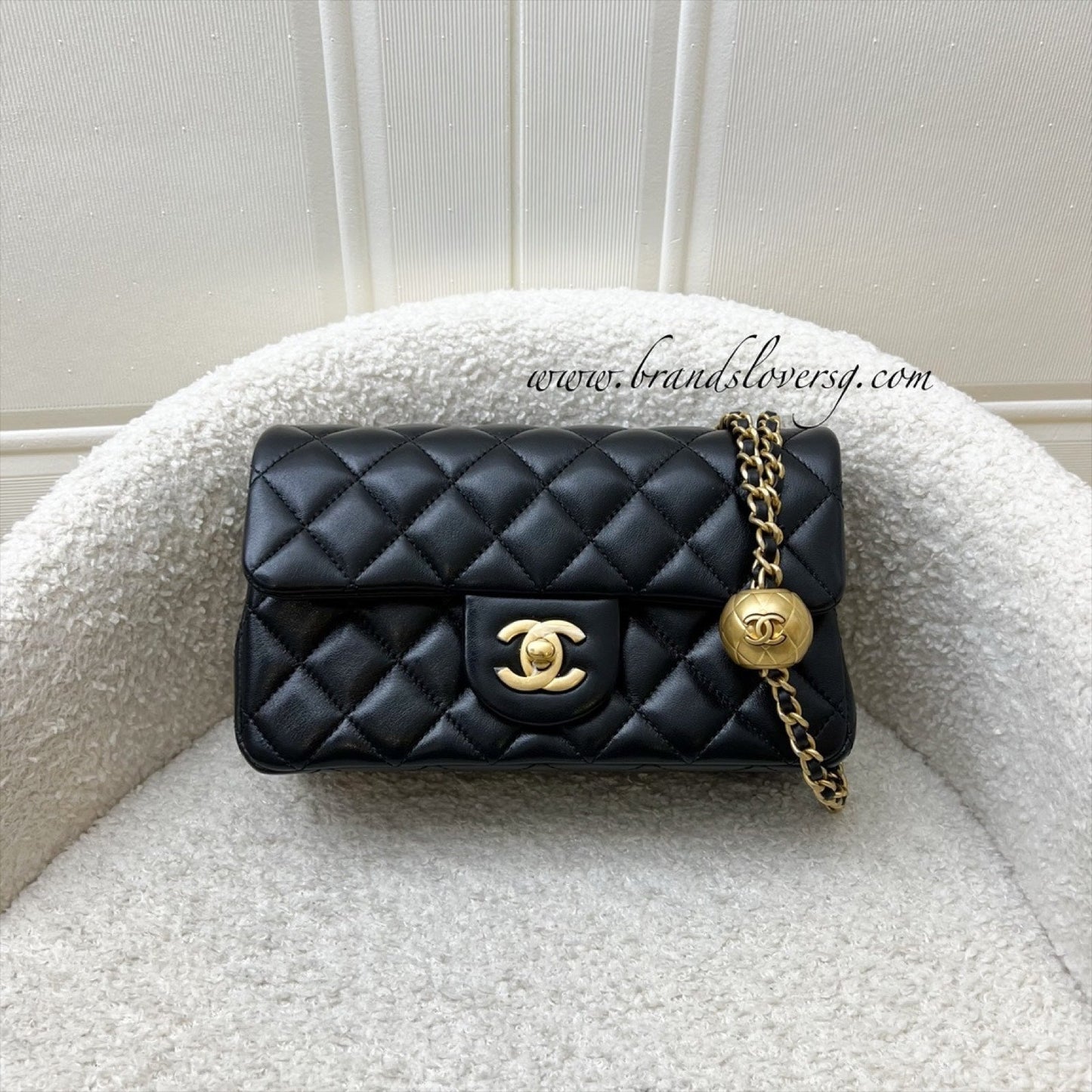 Chanel [Brand new - May 2025] Pearl Crush Mini Rectangular Flap in Black Stiff Lambskin and AGHW (Model: ) Accessory