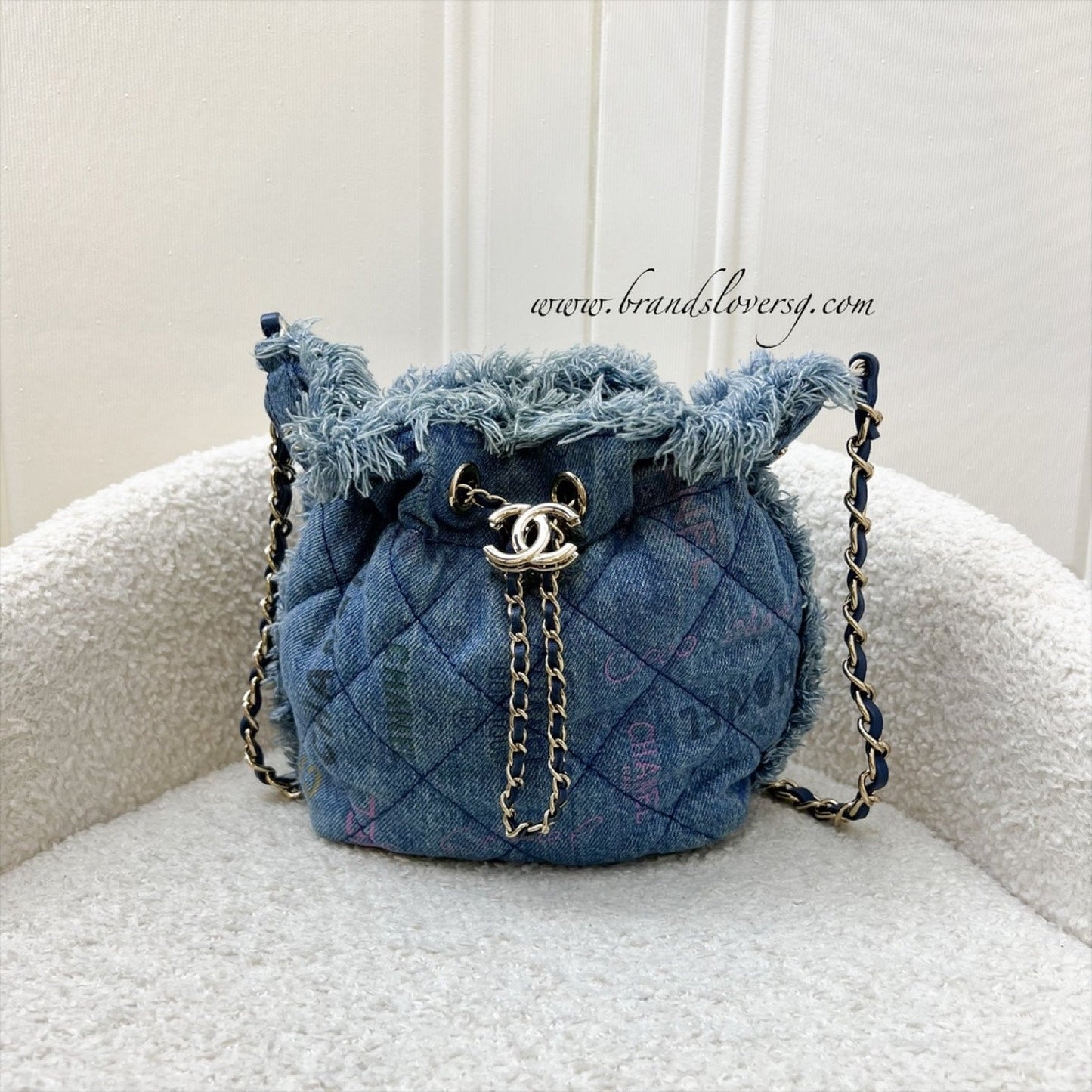 Chanel Denim Mood Mini Drawstring Bucket Bag in Blue Printed Denim and LGHW