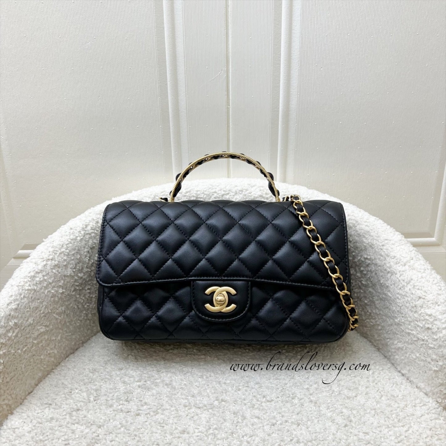 Chanel Small Flap with Top Handle in Black Lambskin and AGHW (Model: ) Bag