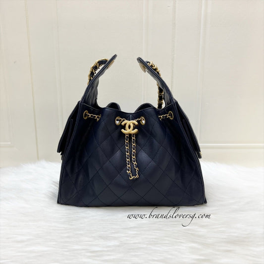 Chanel 25 Small Hobo Bag in Navy Caviar and AGHW