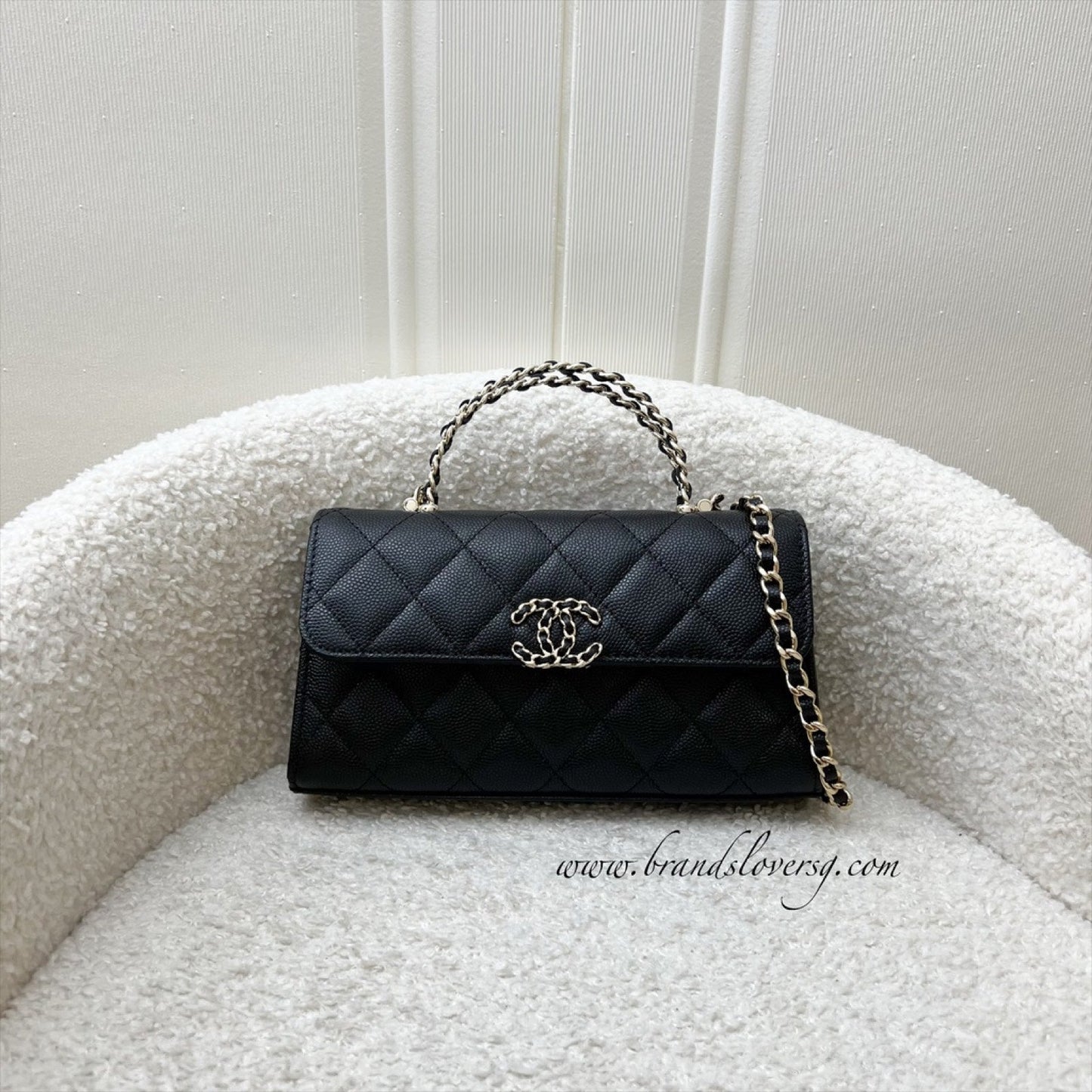 Top Handle Kelly Clutch with Chain in Black Caviar and GHW Signature