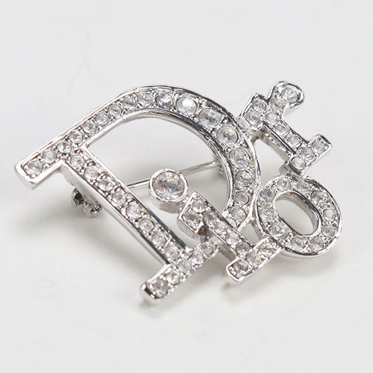 Dior Brooch Other Accessories Metal,Rhinestone Women Handbag Silver Logo Travel Bag