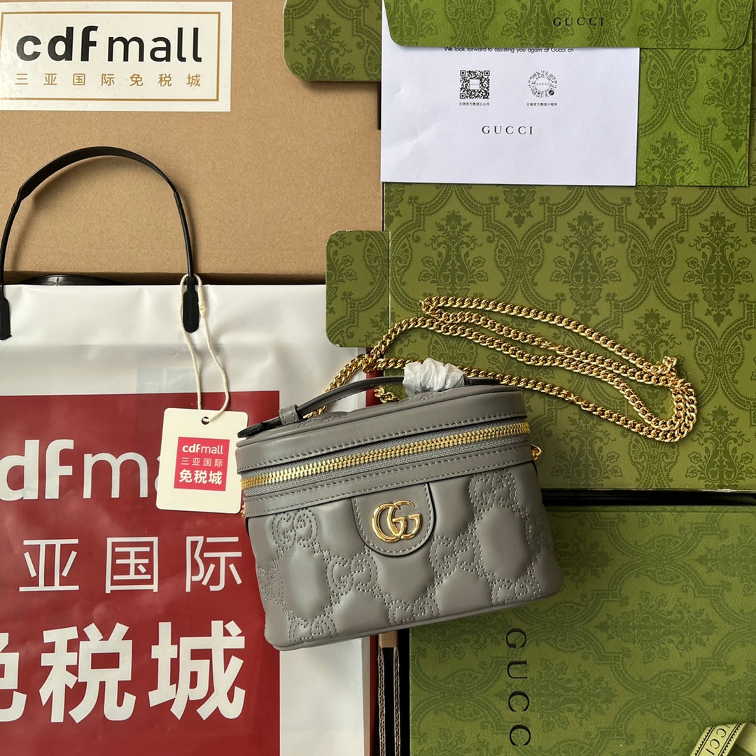 gg , ’s 6. Quilted Gray Mini Travel Bag